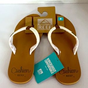 New: Woman’s size 8 flip flops by Reef